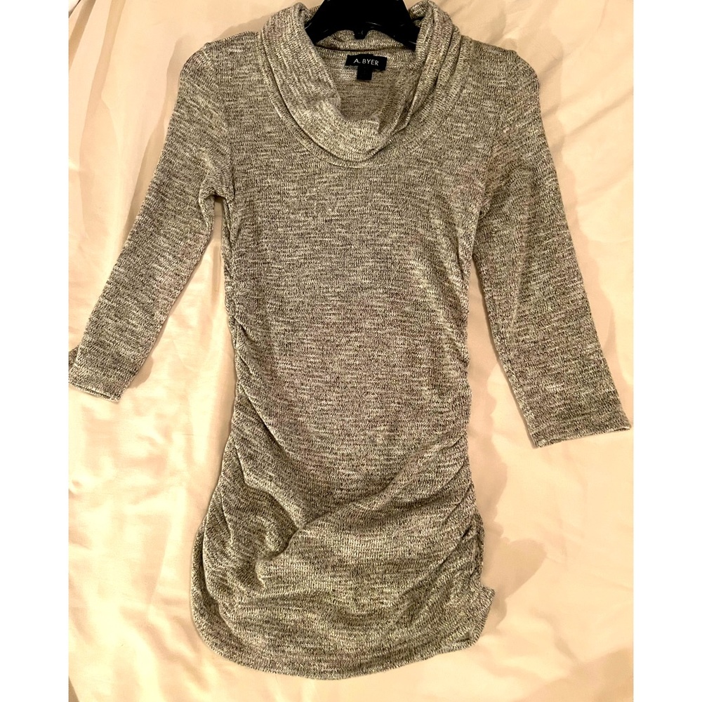Brand new without the tags.  Scrunch sides and gold details.  Size small.